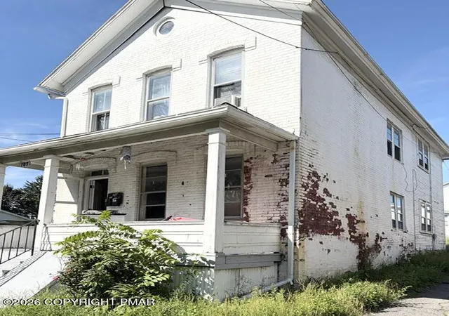 Photo 2 of Multi family home for sale at 707 Mill St, Dunmore, PA 18512 | MLS# PM-144271 | Listing updated on 2026-08-28