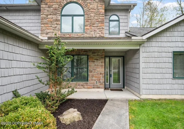 Photo 2 of Single family home for sale at 2236 Hillcrest Dr, Pocono Pines, PA 18350 | MLS# PM-144312 | Listing updated on 2026-09-02