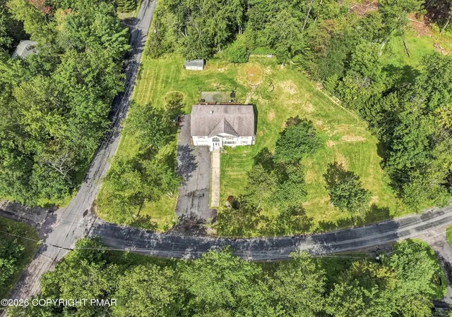 Photo 2 of Single family home for sale at 1123 Chickadee Dr, Pocono Summit, PA 18346 | MLS# PM-144328 | Listing updated on 2026-09-02