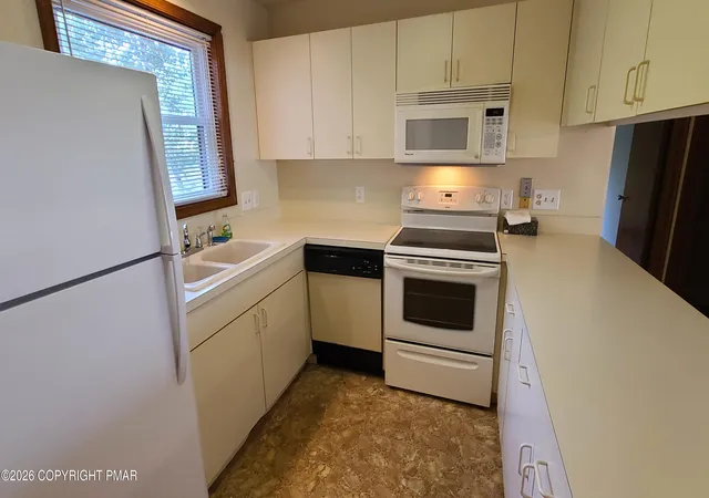 Photo 2 of Condo for sale at 146 Foxfire Dr #APT 203, Mount Pocono, PA 18344 | MLS# PM-144318 | Listing updated on 2026-08-30