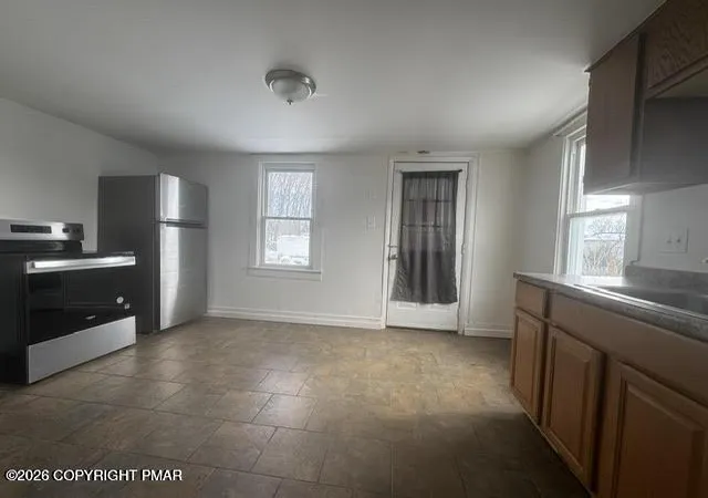 Photo 4 of House for sale at 16 E - 18 Main St, Pen Argyl, PA 18072 | MLS# PM-144339 | Listing updated on 2026-10-01