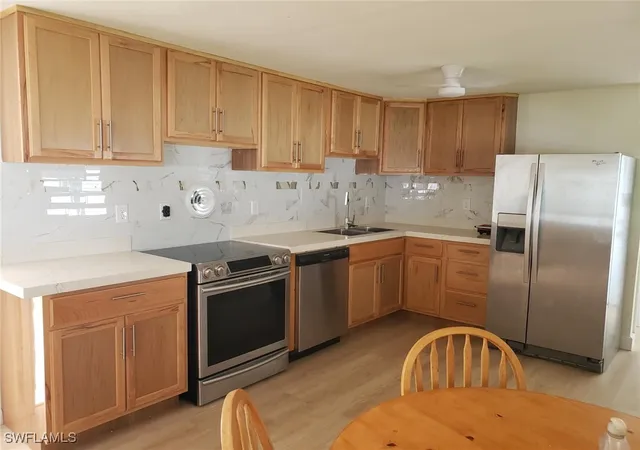 Photo 2 of Manufactured home for sale at 11 Muleshoe Trl #253, Naples, FL 34113 | MLS# 225074289 | Listing updated on 2025-11-05