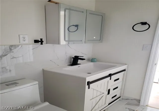 Photo 3 of Manufactured home for sale at 11 Muleshoe Trl #253, Naples, FL 34113 | MLS# 225074289 | Listing updated on 2025-11-05