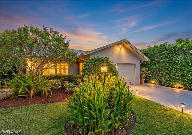 Photo 1 of Single family home for sale at 715 96th Ave N, Naples, FL 34108 | MLS# 225011074 | Listing updated on 2026-07-26