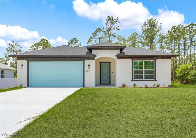 1st image of 337 Woodburn Dr, Lehigh Acres, FL 33972 | MLS# 225053792