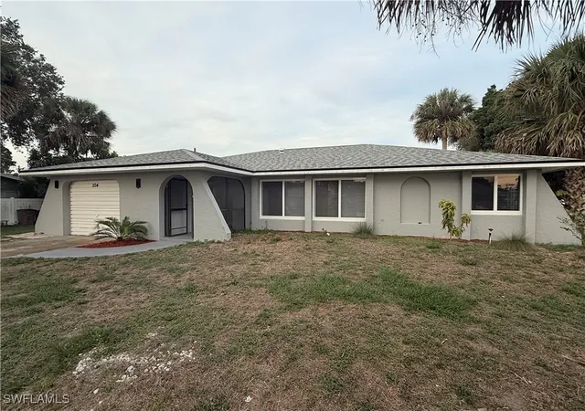 Photo 1 of Single family home for sale at 304 North Ave, Lehigh Acres, FL 33936 | MLS# 225053889 | Listing updated on 2025-12-10