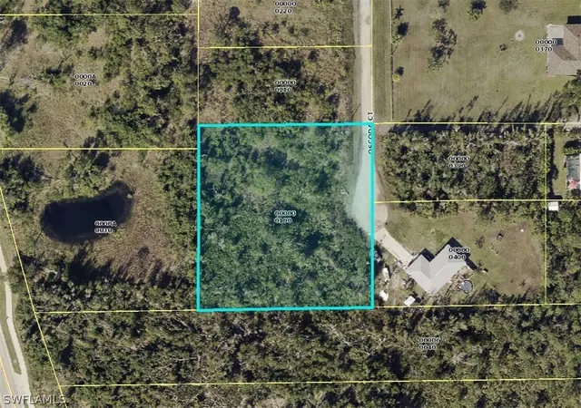 1st image of 11801 Oscoda Ct, Bokeelia, FL 33922 | MLS# 224053688