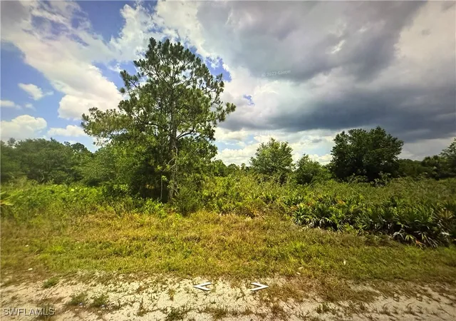 Photo 1 of Land for sale at 407 W 18th Street, Lehigh Acres, FL 33972 | MLS# 225004475 | Listing updated on 2025-12-10