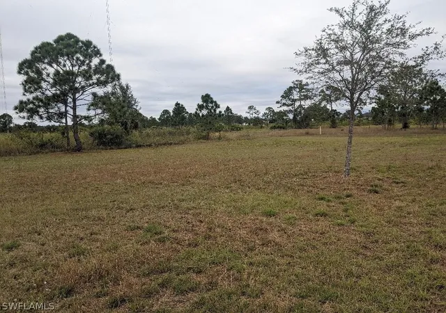 1st image of 7501 1st Pl, Lehigh Acres, FL 33935 | MLS# 223085285