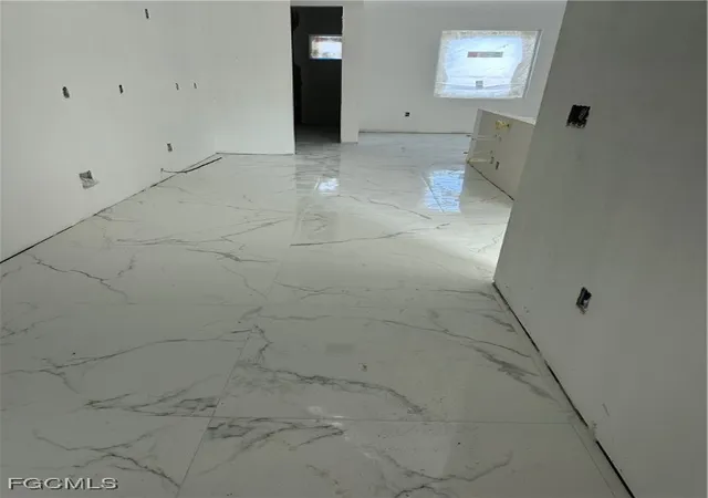 Photo 4 of Single family home for sale at 703 Coolidge Ave, Lehigh Acres, FL 33936 | MLS# 225016403 | Listing updated on 2025-12-30