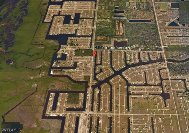 Photo 1 of Land for sale at 2213 Old Burnt Store Rd N, Cape Coral, FL 33993 | MLS# 221018589 | Listing updated on 2026-04-14