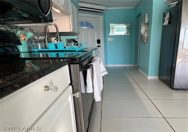 3rd image of 3211 Stringfellow Rd #102, Saint James City, FL 33956 | MLS# 225028726