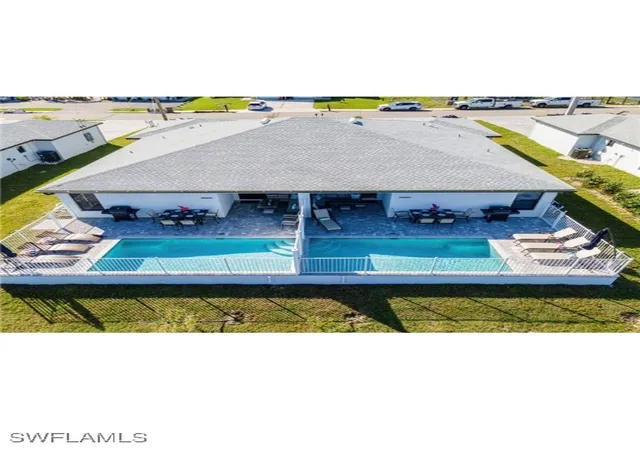 1st image of 317 319 Sw 47th Ter, Cape Coral, FL 33914 | MLS# 224074700
