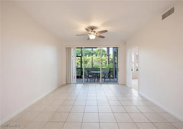 Listing Photo 5 - Condo for sale in building located at 10025 Heather Ln, Naples, FL 34119 - Unit #702