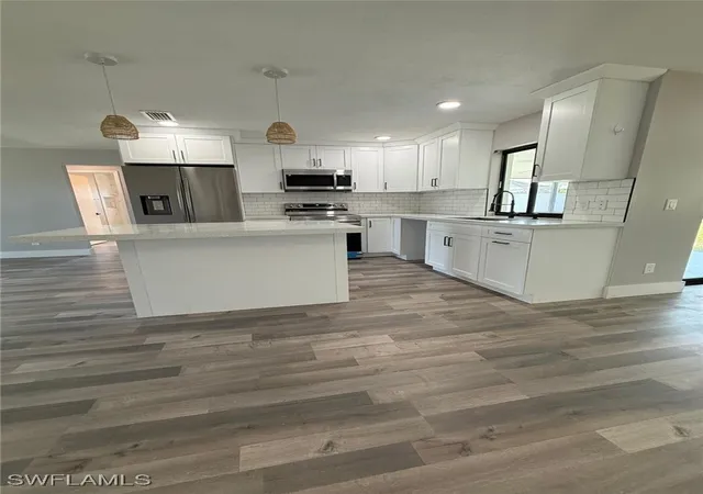 Photo 2 of Single family home for sale at 1219 Se 25th Terrace, Cape Coral, FL 33904 | MLS# 225044926 | Listing updated on 2026-06-01