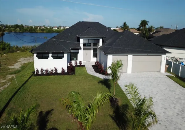 Photo 1 of Single family home for sale at 702 Nw 30th Pl, Cape Coral, FL 33993 | MLS# 225052345 | Listing updated on 2026-05-27