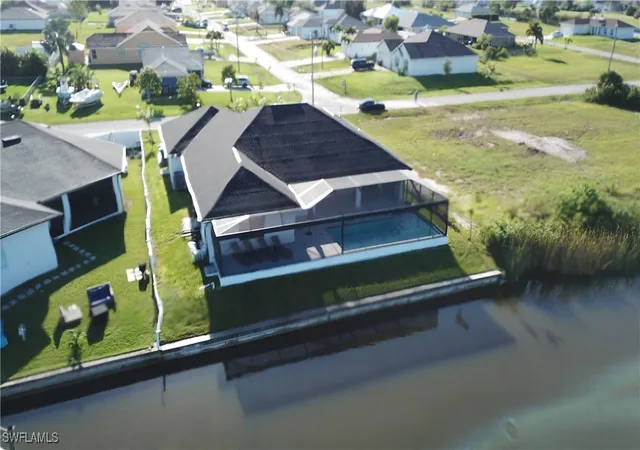 Photo 2 of Single family home for sale at 702 Nw 30th Pl, Cape Coral, FL 33993 | MLS# 225052345 | Listing updated on 2026-05-27