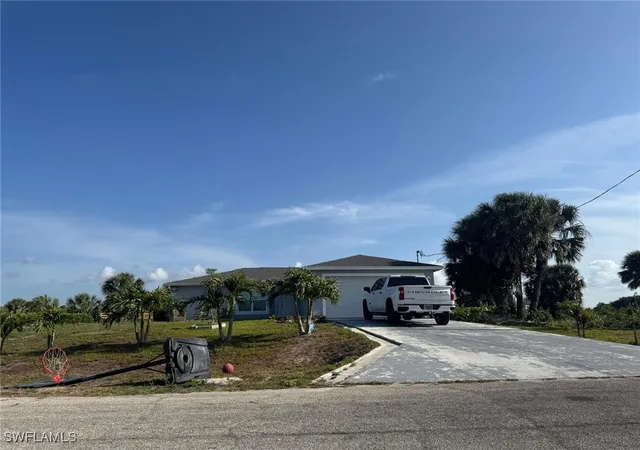 Single family home for sale at 1046 Saturn Ct, La Belle, FL 33935 | MLS# 225040116 | Listing updated on 2025-12-10