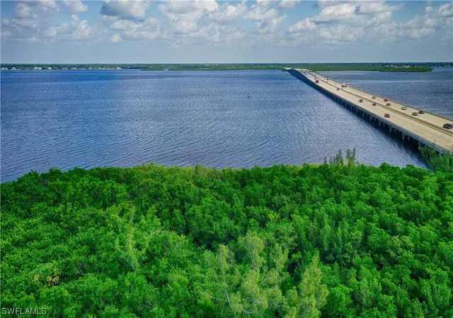 Photo 1 of Land for sale at 26082 Shore Dr, Punta Gorda, FL 33950 | MLS# 223077116 | Listing updated on 2026-01-26