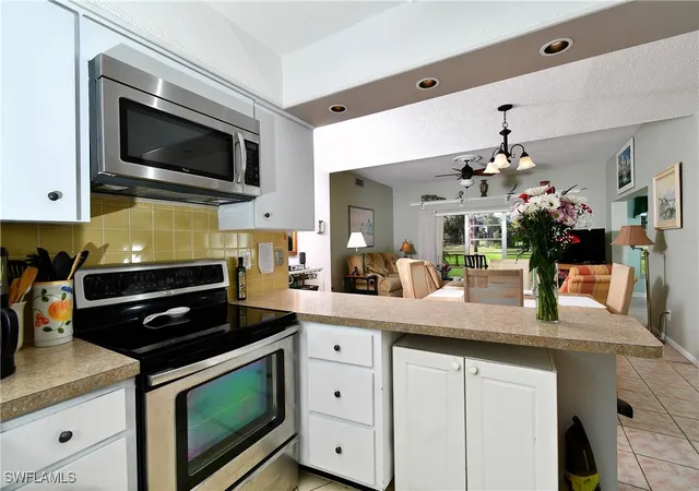Photo 4 of Townhouse for sale at 8 Park Ln Cir, Lehigh Acres, FL 33936 | MLS# 225015236 | Listing updated on 2026-08-04
