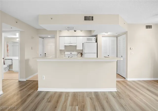 Listing Photo 5 - Condo for sale in building located at 8851 Colonnades Ct W, Bonita Springs, FL 34135 - Unit #128
