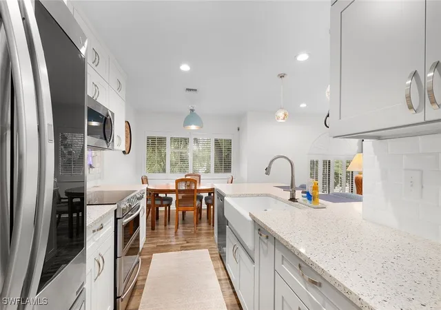 Listing Photo 5 - Condo for sale in building located at 3360 10Th St N, Naples, FL 34103 - Unit #1210