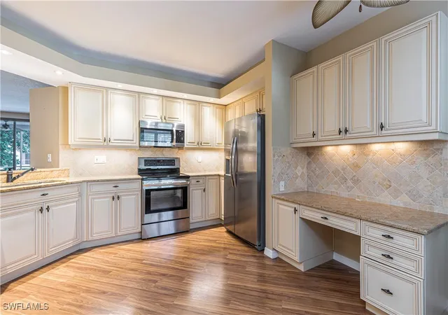 Photo 1 of Condominium at 6914 Satinleaf Rd N #102, Naples, FL 34109 | MLS# 225064393 |  | Sold on 2025-10-30