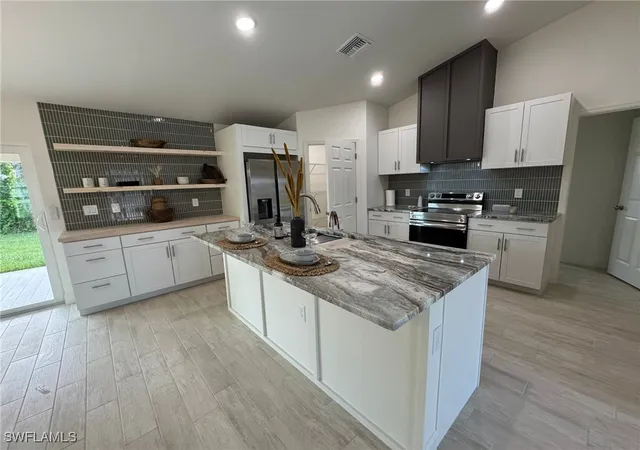 1st image of 1027 Alfreda Ave, Lehigh Acres, FL 33971 | MLS# 225064637