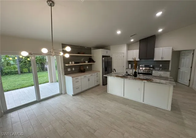 2nd image of 1027 Alfreda Ave, Lehigh Acres, FL 33971 | MLS# 225064637