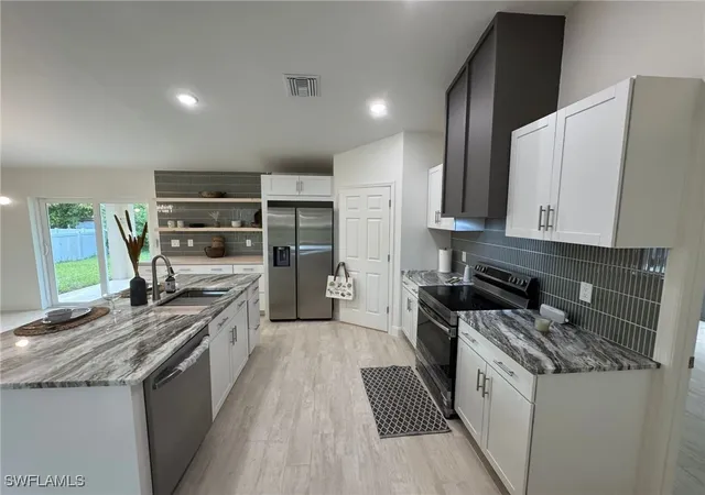 Photo 4 of Sale Pending at 1027 Alfreda Ave, Lehigh Acres, FL 33971 | MLS# 225064637 | Listing updated on 2025-10-23