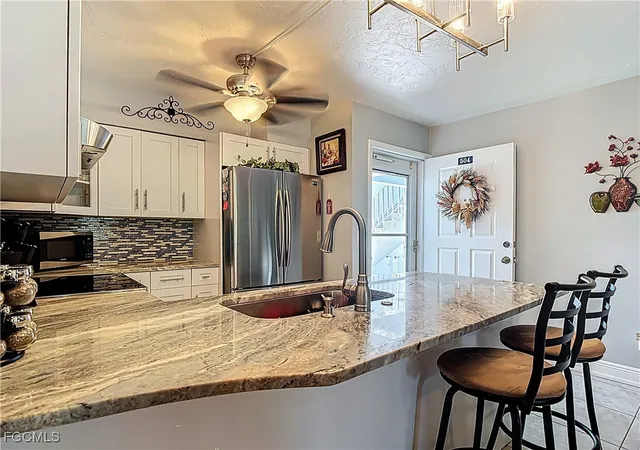 Photo 4 of Condominium at 1100 Pondella Rd #504, Cape Coral, FL 33909 | MLS# 2025003253 | | Sold on 2025-10-31