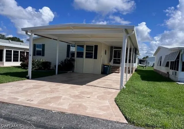 Photo 3 of Manufactured home for sale at 65 Turquoise Ave #65T, Naples, FL 34114 | MLS# 225064920 | Listing updated on 2026-05-15