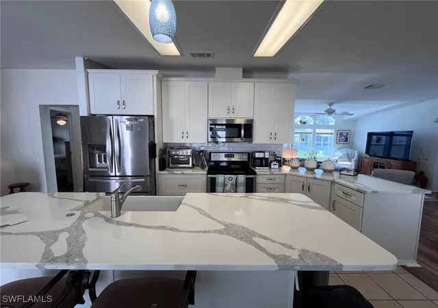 Photo 4 of Manufactured home for sale at 65 Turquoise Ave #65T, Naples, FL 34114 | MLS# 225064920 | Listing updated on 2026-05-15