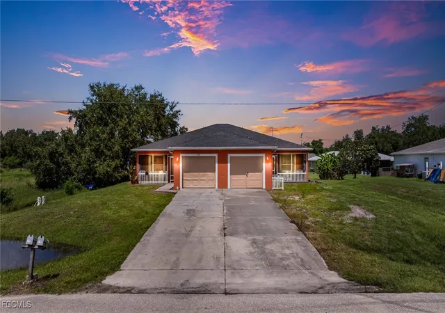 Photo 1 of Sale Pending at 328/330 Gretchen Ave S, Lehigh Acres, FL 33973 | MLS# 2025003519 | Listing updated on 2025-10-07