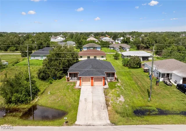 Photo 3 of Sale Pending at 328/330 Gretchen Ave S, Lehigh Acres, FL 33973 | MLS# 2025003519 | Listing updated on 2025-10-07