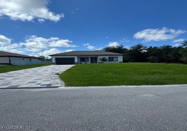 1st image of 520 Millcreek St, Lehigh Acres, FL 33974 | MLS# 2025006808