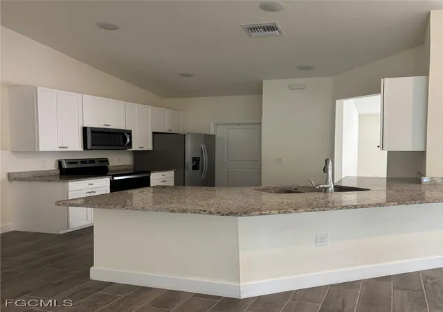 Photo 3 of Single family home for sale at 2614 27th Street W, Lehigh Acres, FL 33971 | MLS# 2025011247 | Listing updated on 2026-03-31