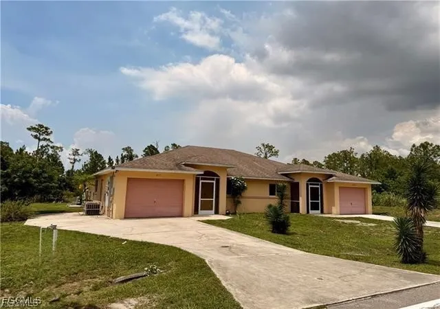 Photo 1 of Multi family home for sale at 1221 1223 E 12th Street, Lehigh Acres, FL 33972 | MLS# 2025011419 | Listing updated on 2026-04-21