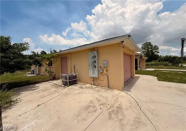 Photo 3 of Multi family home for sale at 1221 1223 E 12th Street, Lehigh Acres, FL 33972 | MLS# 2025011419 | Listing updated on 2026-04-21