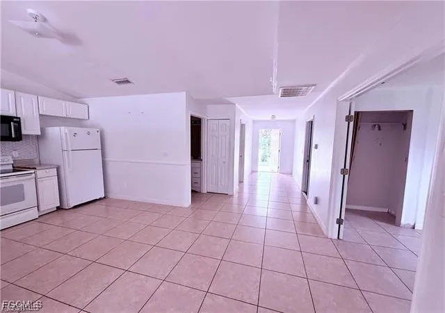 Photo 3 of House for sale at 1221-1223 E 12th Street, Lehigh Acres, FL 33972 | MLS# 2025011419 | Listing updated on 2026-04-21