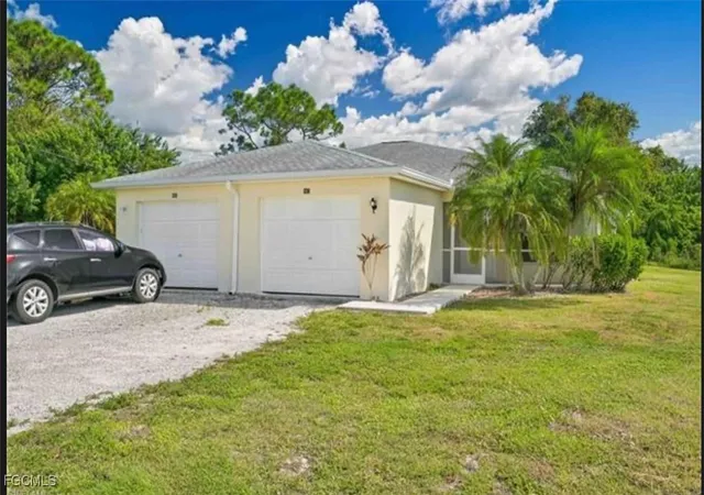 Photo 1 of Multi family home for sale at 465 467 Lillon Ave S, Lehigh Acres, FL 33974 | MLS# 2025011964 | Listing updated on 2026-03-17