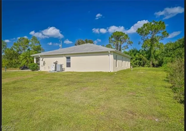 Photo 3 of Multi family home for sale at 465 467 Lillon Ave S, Lehigh Acres, FL 33974 | MLS# 2025011964 | Listing updated on 2026-03-17