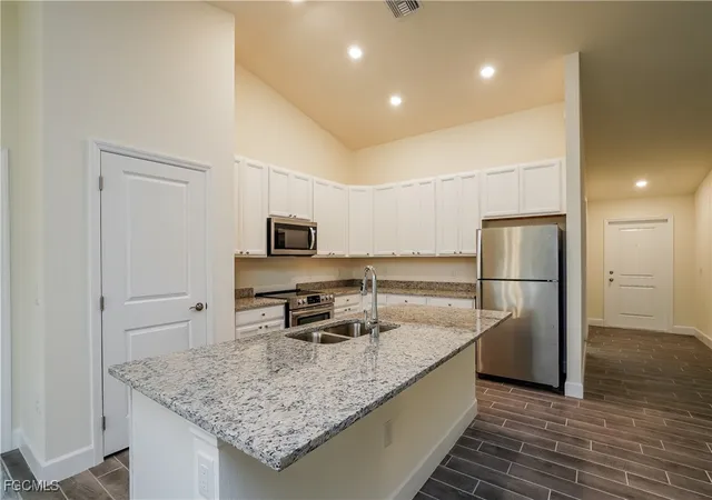 3rd image of 2704 23Rd St W, Lehigh Acres, FL 33971 | MLS# 2025012307