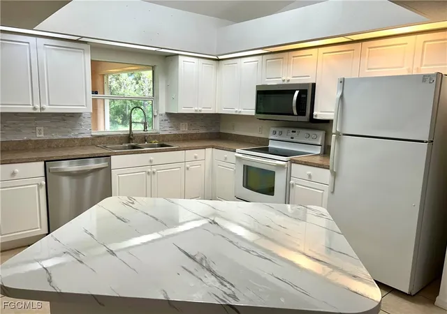 Photo 4 of Single family home for sale at 947 Hunter St E, Lehigh Acres, FL 33974 | MLS# 2025013415 | Listing updated on 2026-08-31