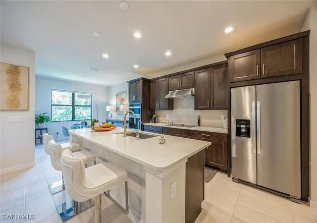 Photo 3 of Townhouse for sale at 13057 Pembroke Dr, Naples, FL 34105 | MLS# 225075043 | Listing updated on 2026-05-15