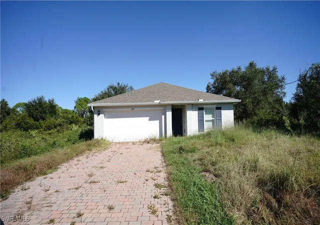 1st image of 666 Vanola Ct, Lehigh Acres, FL 33972 | MLS# 225075189