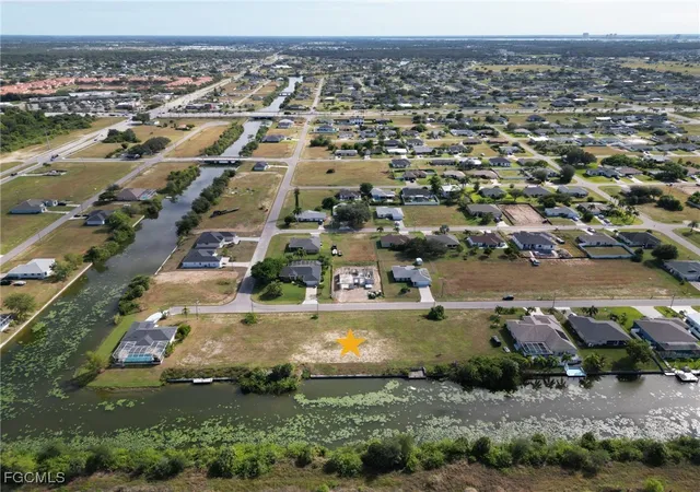 Photo 3 of Land for sale at 2214 NE 13th Avenue, Cape Coral, FL 33909 | MLS# 2025015551 | Listing updated on 2025-12-10
