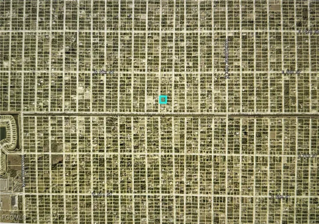 Photo 3 of Land for sale at 808 Poinsettia Ave, Lehigh Acres, FL 33972 | MLS# 2025016322 | Listing updated on 2025-12-10