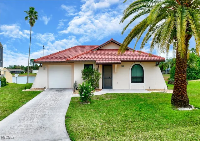 Photo 1 of Sale Pending at 506 Causeway Dr, Lehigh Acres, FL 33936 | MLS# 2025016743 | Listing updated on 2026-07-30