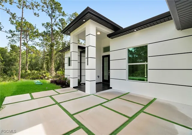 1st image of 1021 Moore Ave, Lehigh Acres, FL 33972 | MLS# 2025016881